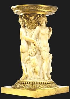 A Carved Ivory Cylindrical Tankard Sleeve of the Three

Graces,1605-1668, ivory, 35 cm.